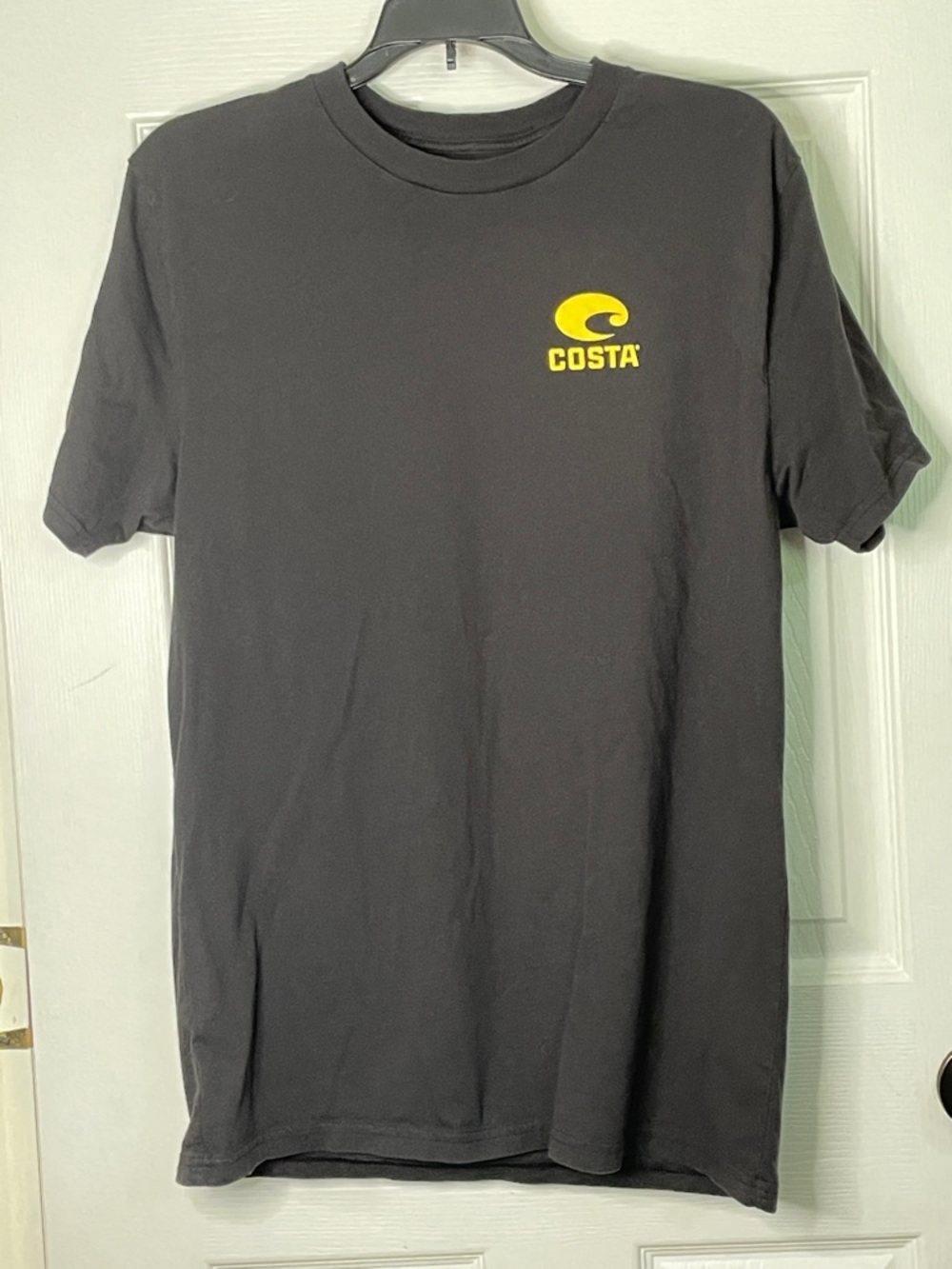 Costa Black Short Sleeve Tee with Yellow Logo. Size L